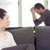 woman staring at scared man