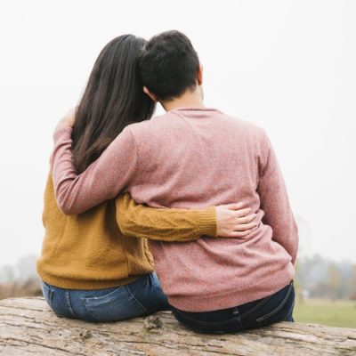 loving-couple-on-log