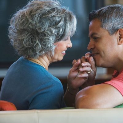 older couple holding hands