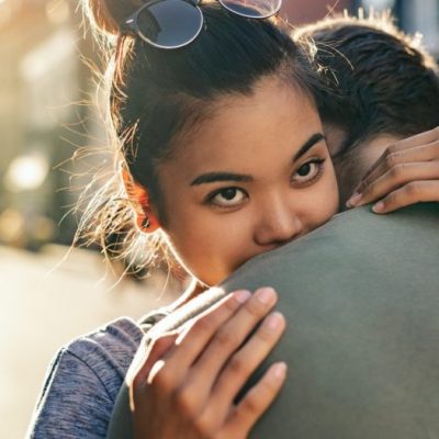 woman-hugging-man-smiling