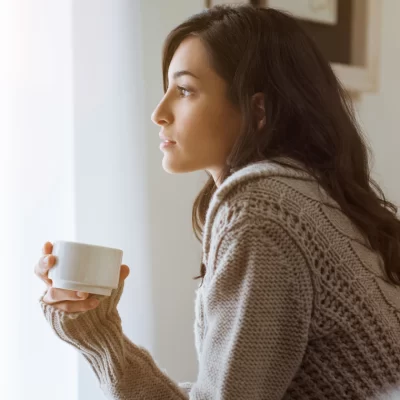 woman-staring-out-window